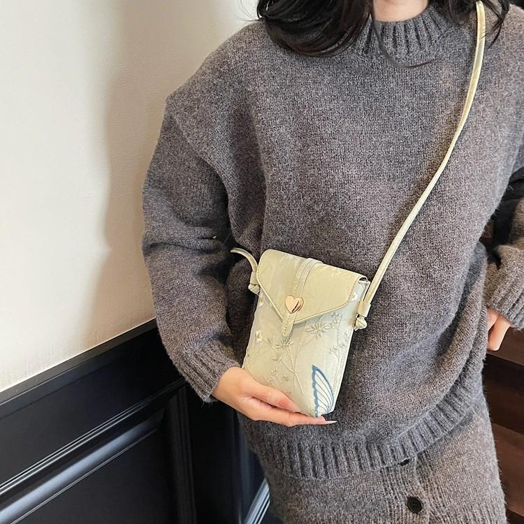 Embroidered canvas bag women's summer new fashion niche messenger bag mobile phone bag