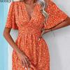 MODIQUE 2025 Summer New Women's Sexy Casual Floral Printing Ruffles Elastic Waist Short Dress Ladies X-Line Hot Batwing Sleeve V-Neck Dress