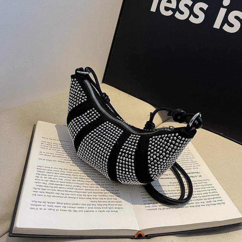 

French niche design textured bag women s 2025 new hot diamond dumpling bag fashionable versatile shoulder messenger bag серебряный