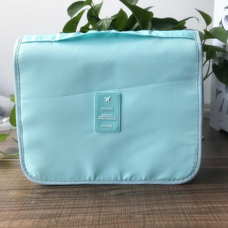 "Korean Waterproof Travel Storage Bag - Large Capacity, Portable, Unisex, with Hook for Toiletries and Makeup"