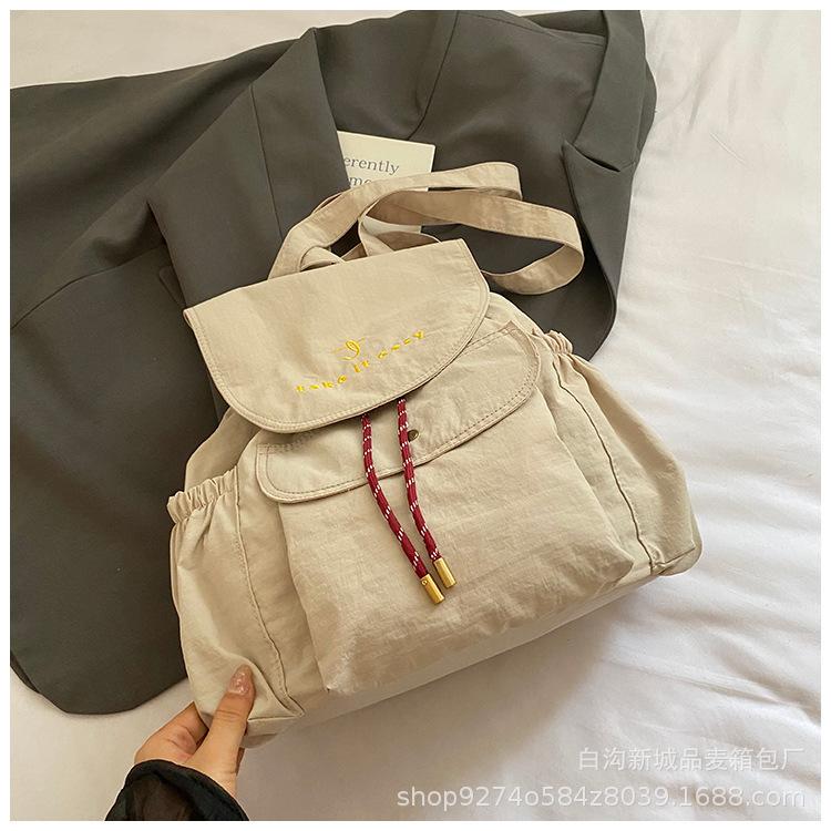 

Casual and lightweight travel backpack bag for women 2025 new large-capacity simple canvas travel backpack student schoolbag