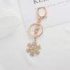 Christmas Snowflake Metal Keychain Set: Exquisite Small Hollow Gold Pendants