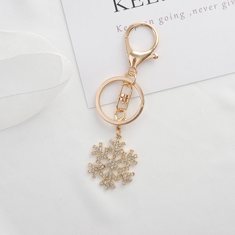 Christmas Snowflake Metal Keychain Set: Exquisite Small Hollow Gold Pendants