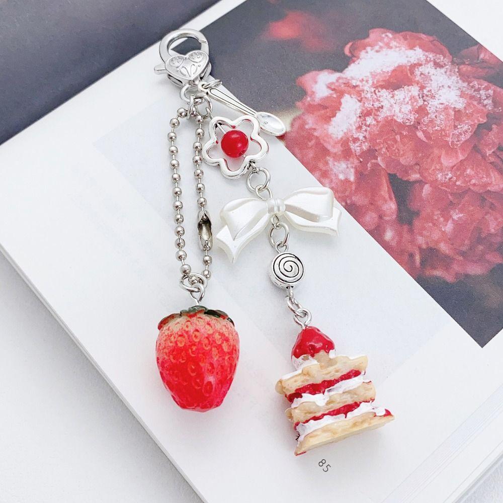 Fashion Unique Bow Heart Phone Charm Cute Creative Strawberry Cake Pendant Keychain Luxury Phone Lanyard Bag Phone Accessories