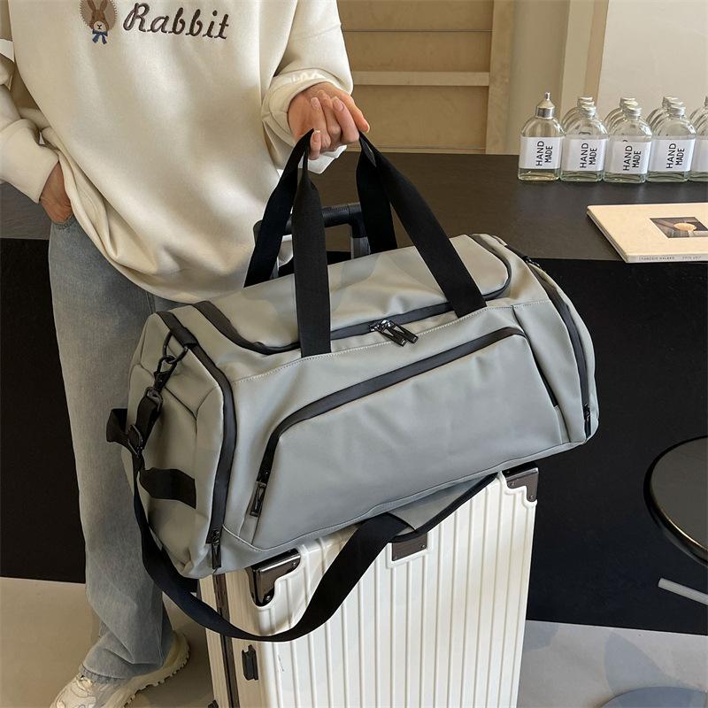 Travel Bag Large Capacity Waterproof Short-distance Portable Duffel Bag Storage Business Trip Boarding Bag Premium Sense Messenger Fitness Bag