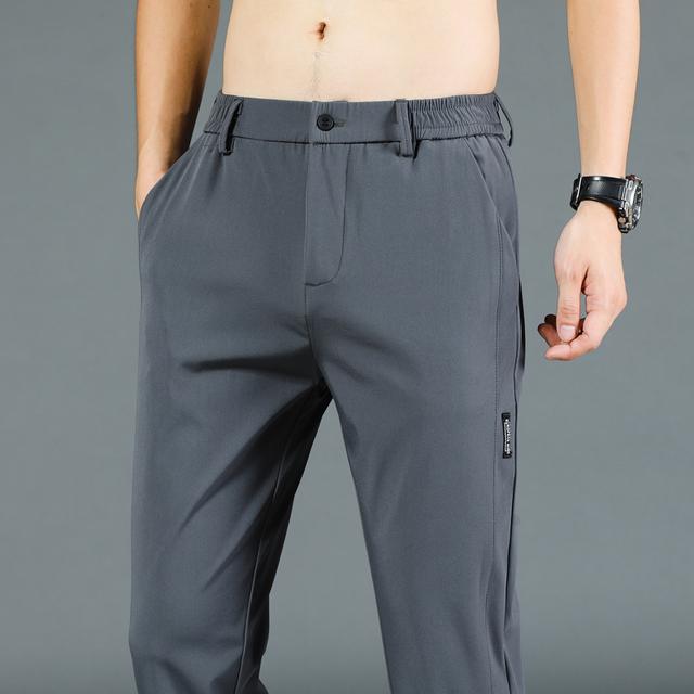 Pantalones casuales finos de primavera/verano para hombre, pantalones de seda helada para hombre, pantalones rectos ajustados coreanos de moda para hombre