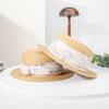 Rongmei spring and summer new French flat-top straw hat women's new fashion seaside vacation straw straw shading woven hat