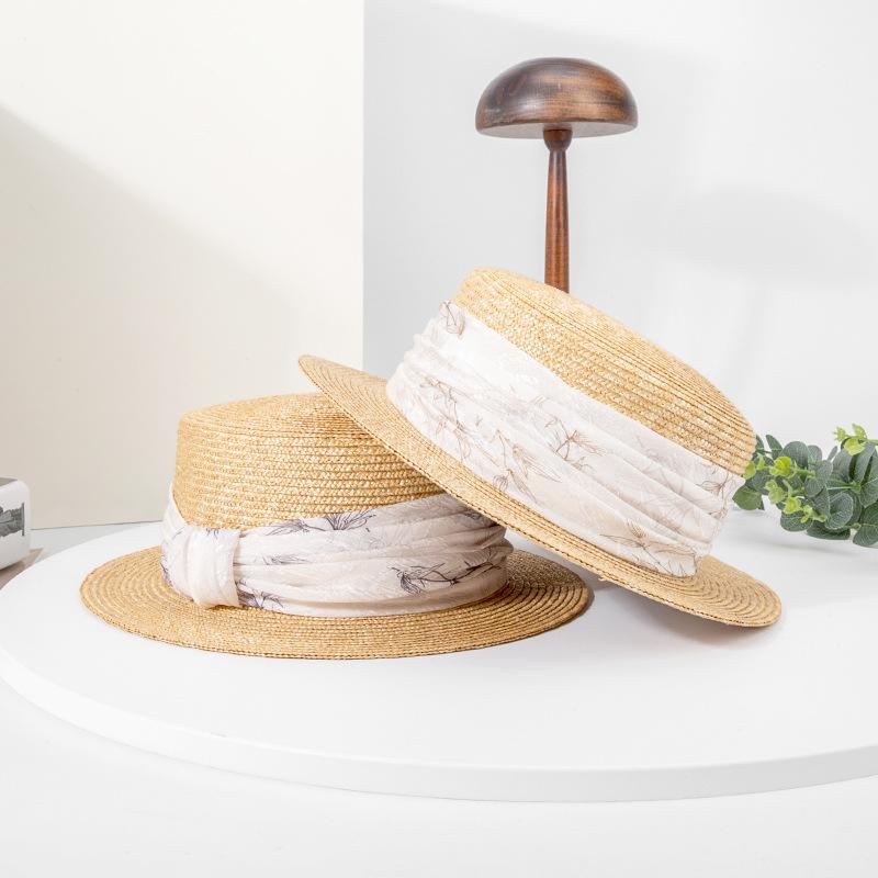 Rongmei spring and summer new French flat-top straw hat women's new fashion seaside vacation straw straw shading woven hat