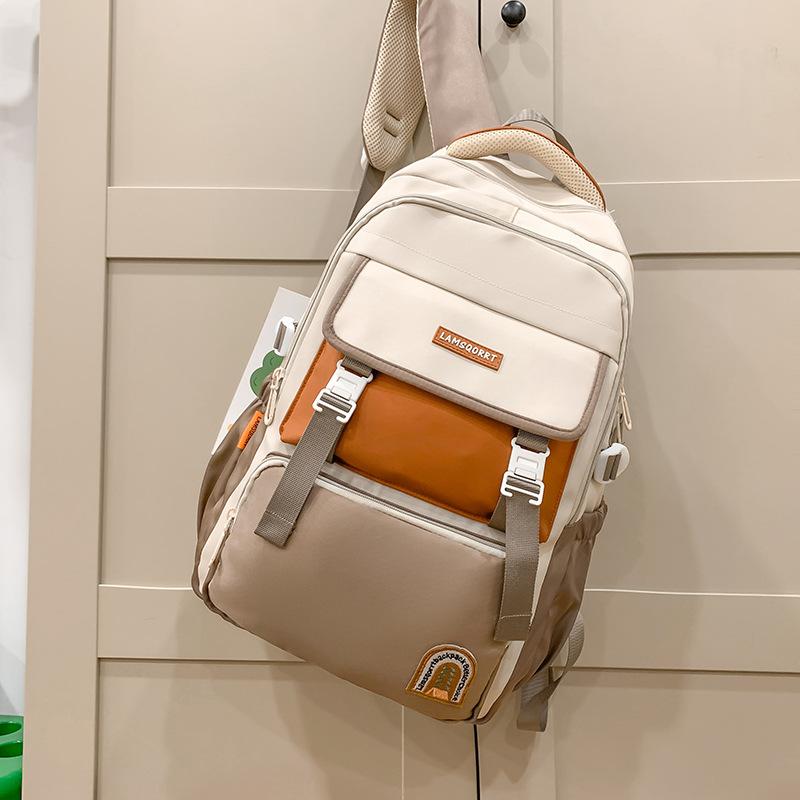 

New student schoolbag junior high school high school backpack large capacity lightweight leisure bag boys and girls splicing schoolbag fashion