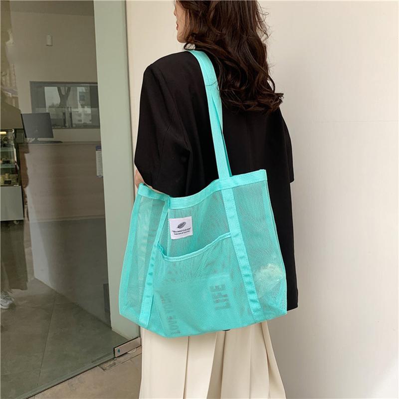 Sac à bandoulière en maille transparente pour femme, à la mode, portable, pour le shopping, le voyage, la plage, sac fourre-tout en filet