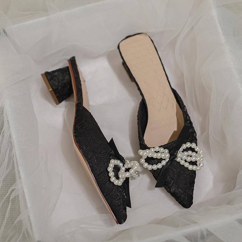 

Baotou wears half slippers, women s summer 2025 new women s shoes are popular this year, pointed middle heel thick heel cool slippers 34 чёрный