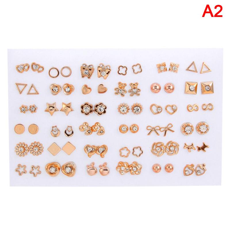 

36 пар сережек смешанного дизайна со стразами, кристаллами, бабочками, бантами, цветами и сердцами из пластика A2