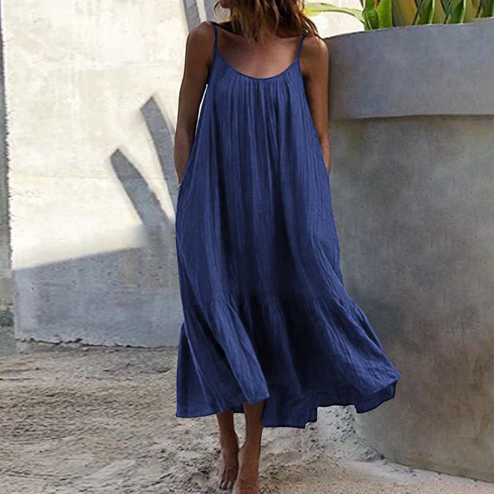 

Модна жіноча однотонна довга сукня без рукавів із рюшами на бретельках XL темно-синього кольору