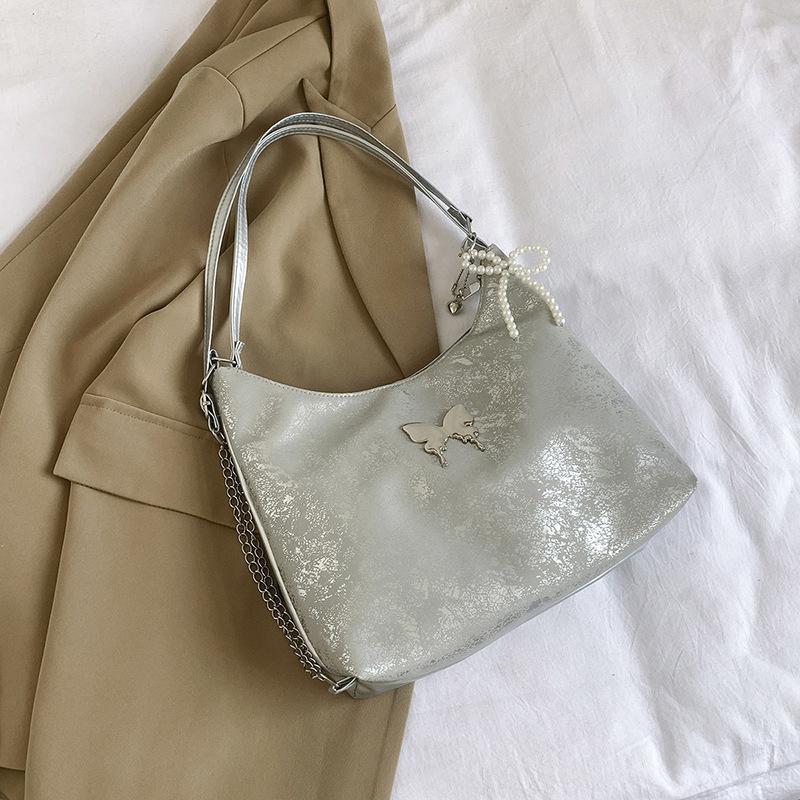 

Tote bag women s 2024 new large-capacity commuter backpack summer beautiful chain shoulder bag casual backpack Without pendant срібний