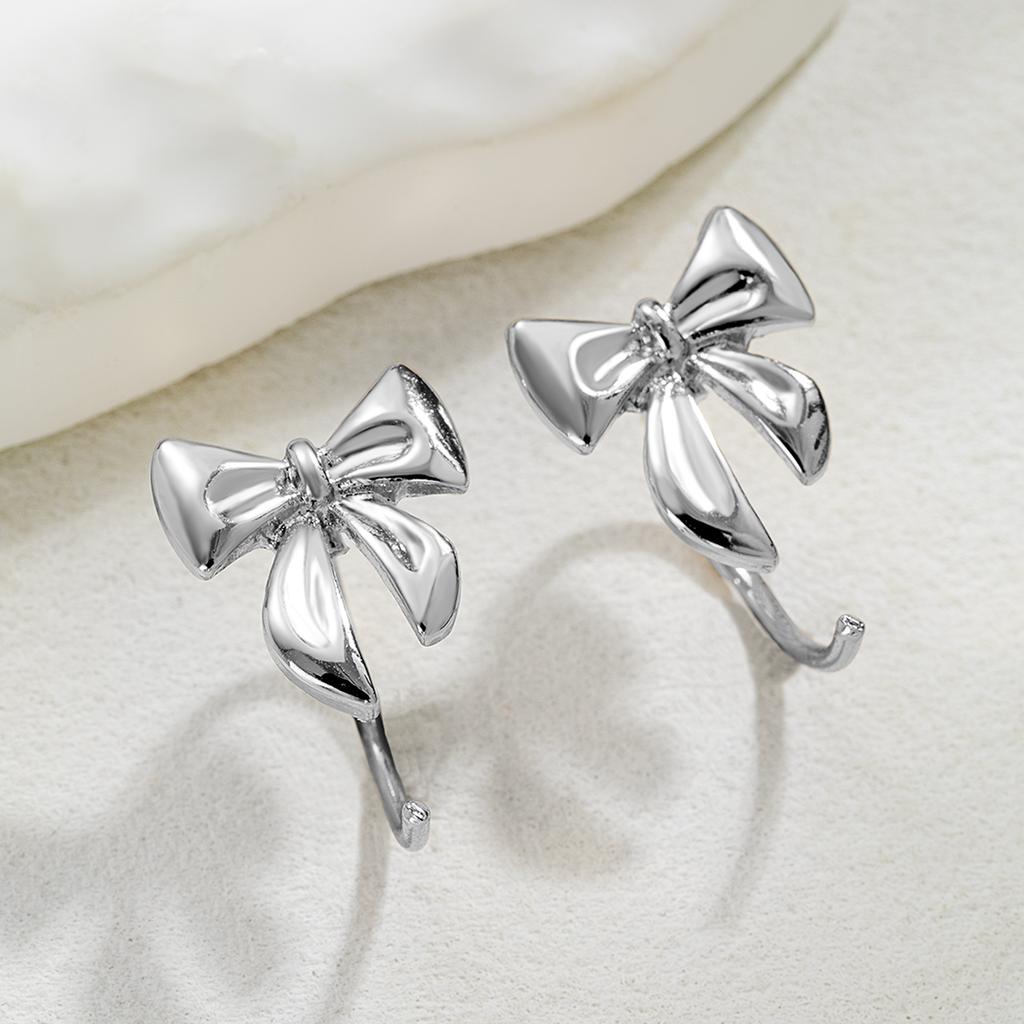1 pair of elegant and fashionable alloy bow ear hooks, simple and versatile women's earrings