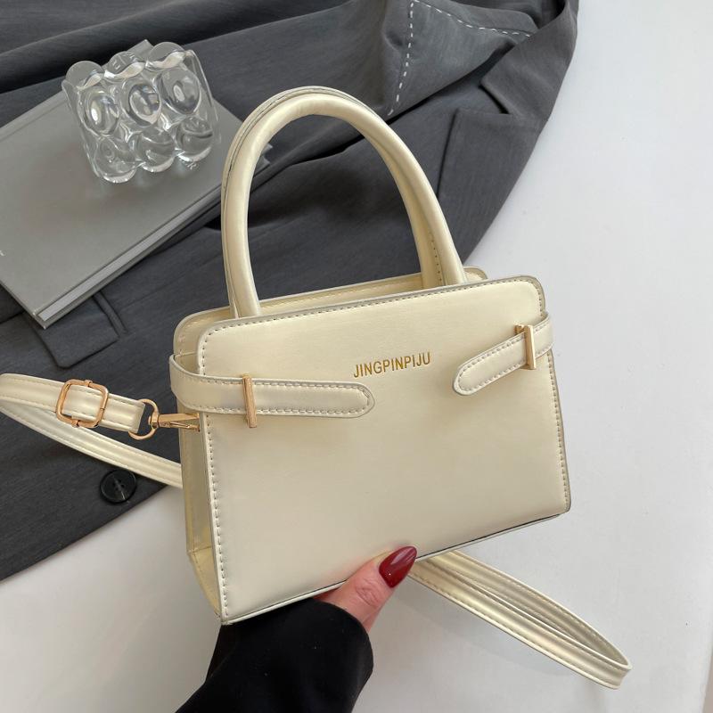 Modische Pendler-Handtasche Damen neue einfache temperamentvolle kleine quadratische Tasche vielseitige Einzel-Schulter-Umhängetasche Damen-Tasche