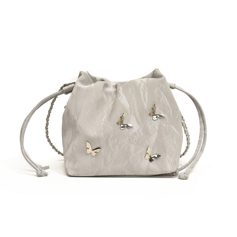 Fashion casual chain messenger bag summer simple pumping strap personalized butterfly shoulder bag new bucket women's bag