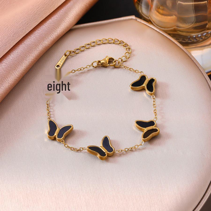 Elegant Titanium Steel Butterfly Bracelet for Women: Black & White Mother-of-Pearl, Gold-Plated, High-End Fashion Jewelry.