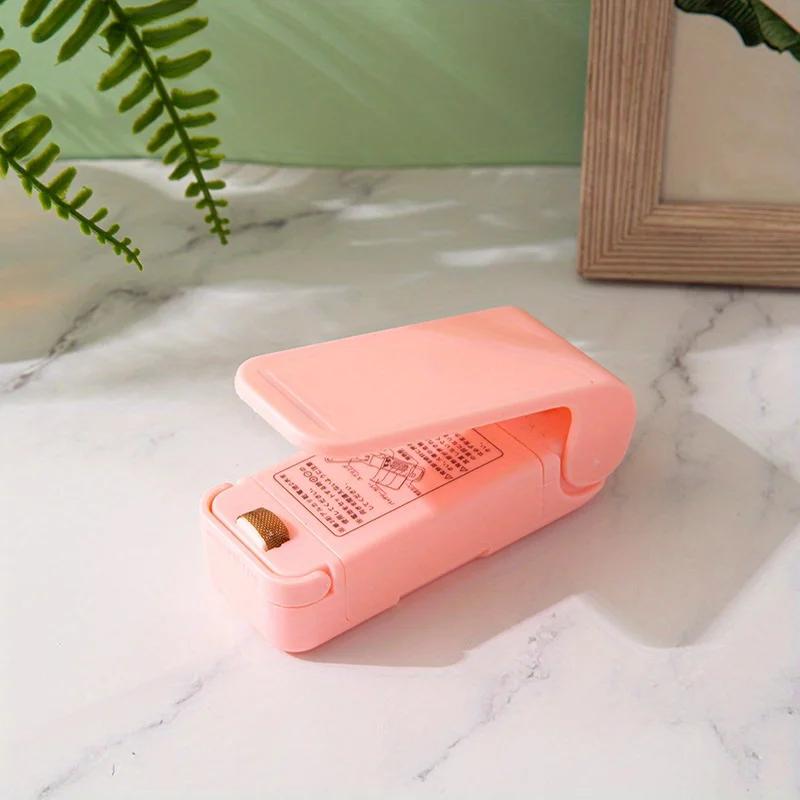 

Портативный мини-запайщик для снеков, ручной запайщик пластиковых пакетов для снеков, маленький запайщик пакетов розовый