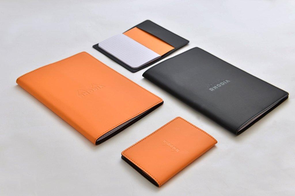 Rhodia A5 Epurée Black Notebook with Cover (A5 Stapled Notebook with 5mm Grid and Orange Lines) (RHODIA cf118159)