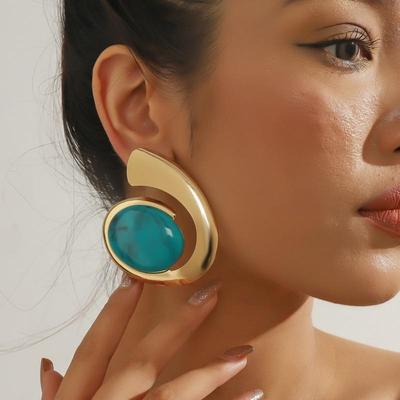 Turquoise Trendy Statement Earrings: Unique Summer Design for a Bold Look.
