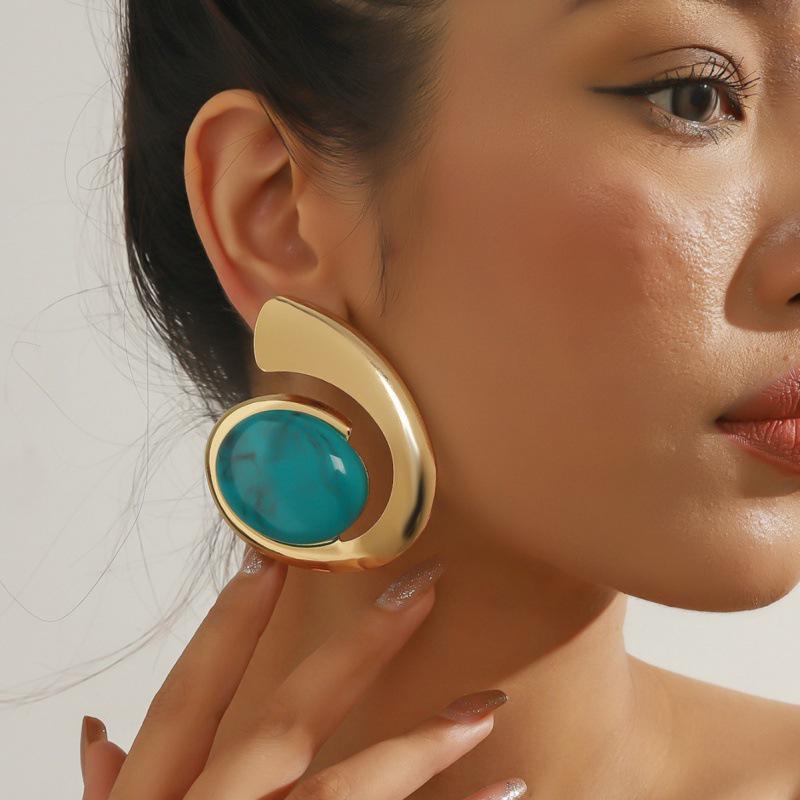 Turquoise Trendy Statement Earrings: Unique Summer Design for a Bold Look.