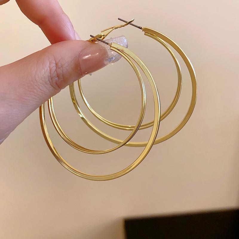 

Steel needle multi-layer plain ring earrings women s European and American exaggerated atmosphere earrings fashion temperament earrings advanced sense