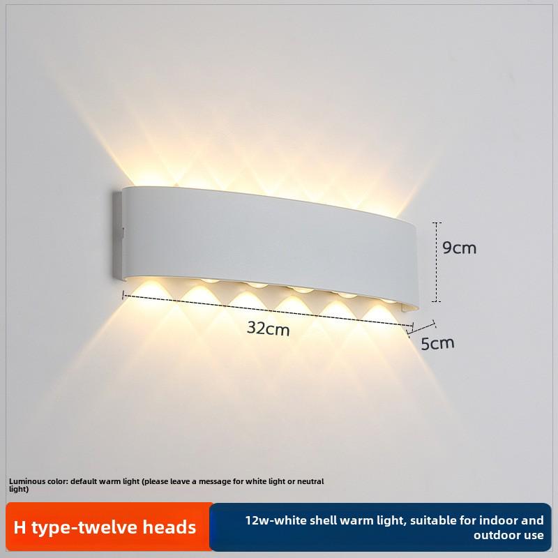 LED Outdoor Four-Leaf Clover Wall Light - Up and Down Beam Decoration for Garden and Exterior Walls.