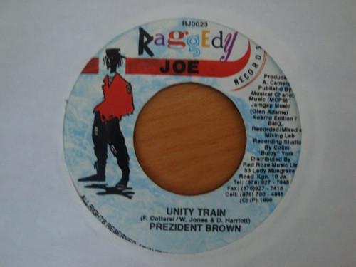 

7-дюймовая пластинка PREZIDENT BROWN / FABBY DOLLY - Unity Train / Oh Jah Jah RJ0023 Raggedy Joe Rec 1998 Ямайка Регги, Ска и Даб Б/У
