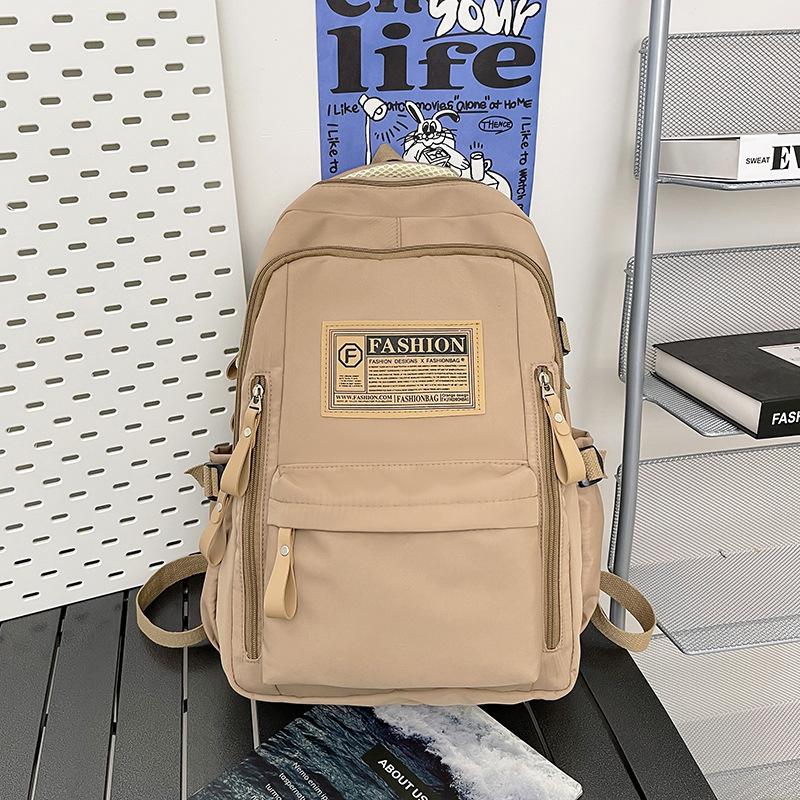 2025 new backpack girls college student schoolbag boys junior high school high school students primary school students large capacity travel backpack