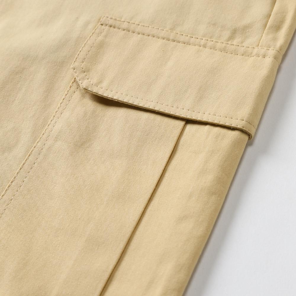 2025 Novos shorts masculinos casuais para praia ao ar livre com vários bolsos, moda cor sólida, shorts de praia para férias masculinos