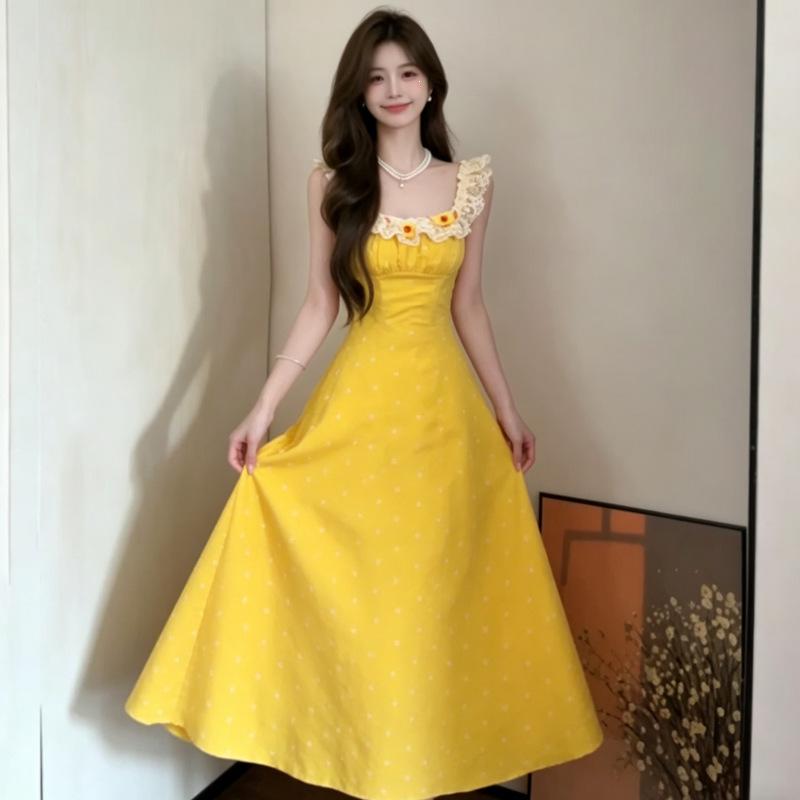 French holiday style yellow dress women's summer 2026 new super fire wear with floral suspenders long skirt sleeveless
