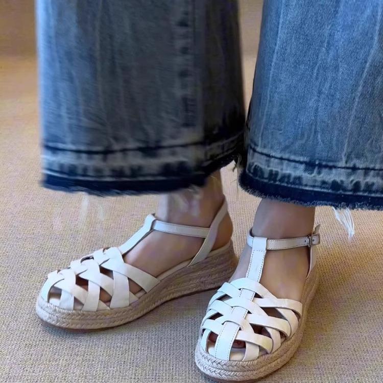 

French retro woven hollow bag head sandals women s outer wear 2025 summer new fashionable versatile wedge heel Roman shoes 35