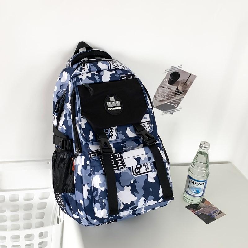 Fashion new simple large-capacity backpack, junior high school student schoolbag, male trend camouflage printing trend backpack