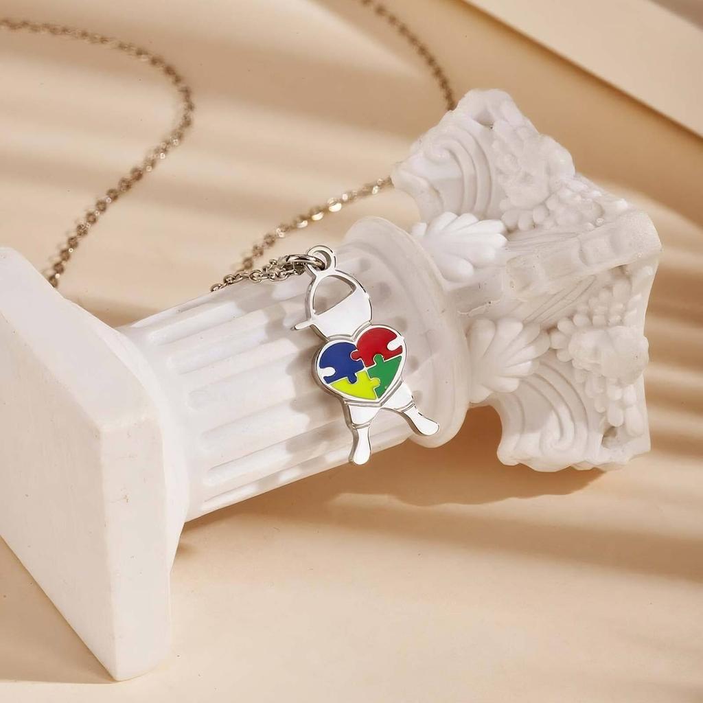 Collana a forma di puzzle a cuore in acciaio inossidabile Vnox, Ciondolo puzzle per la consapevolezza dell'autismo per ragazzi e ragazze, Gioielli alla moda Regali