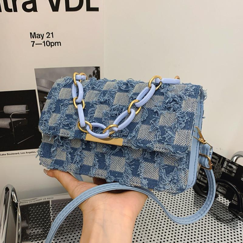 Fashionable Medium-sized Canvas Handbag With Unique Stitching And Tassel Features