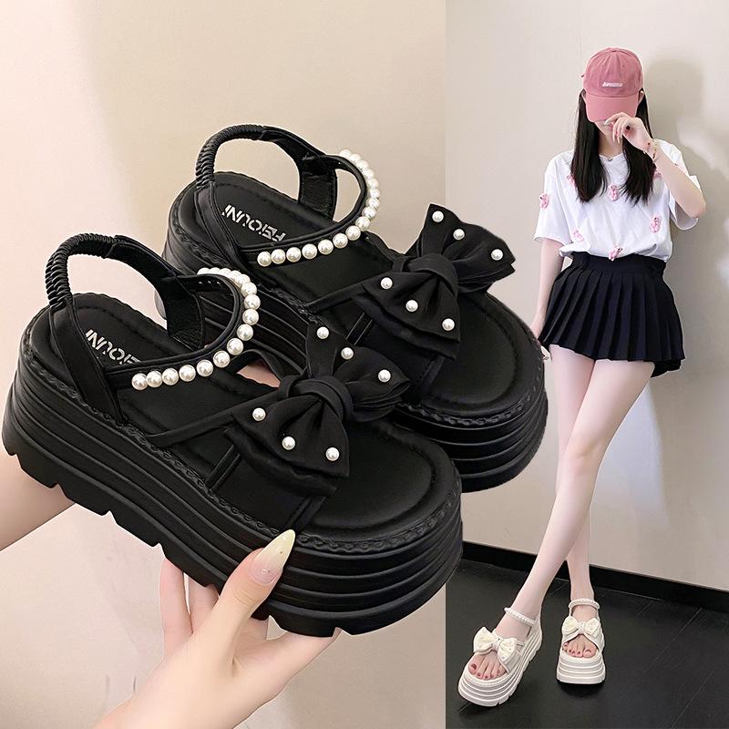 Platform bow sandals female popular summer new Korean version fairy wind pearl one-word buckle with muffin beach sandals