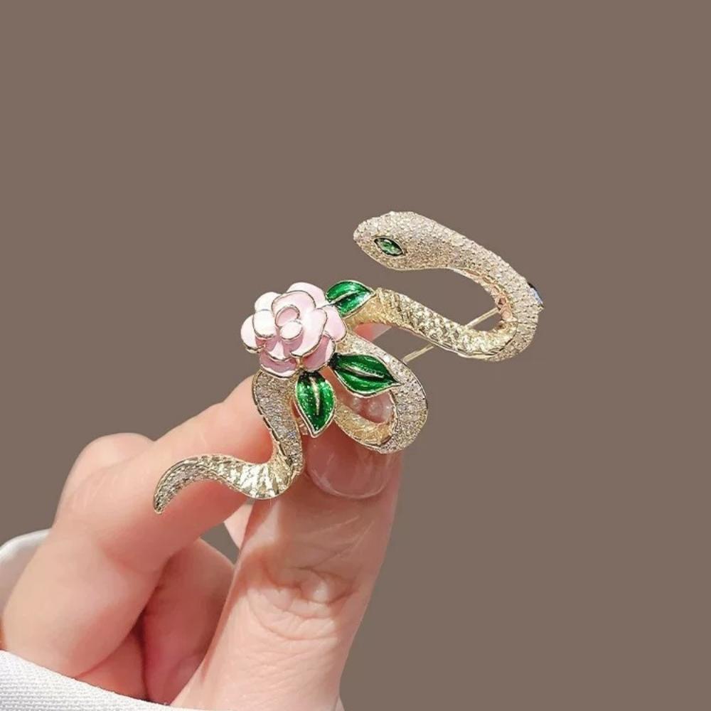 Women's snake-wrapped camellia brooch