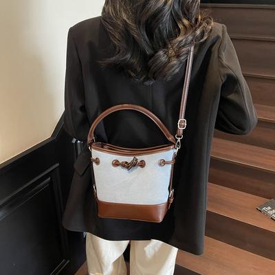 Nischen-Canvas-Spleiß-Eimertasche Damen neue tragbare Pendlertasche Mode Schulter Messenger Bag Tide