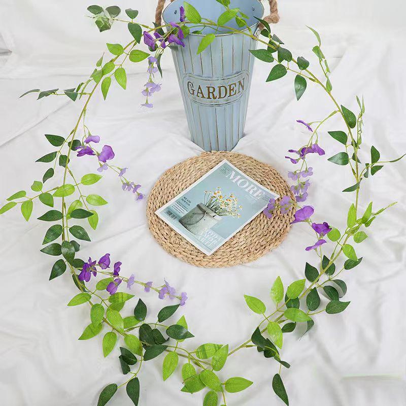 

2pcs Simulation Wisteria Flowers Plastic Green Plant Wedding Decor Artificial Wisteria Flower Vine Shopping Mall Decoration