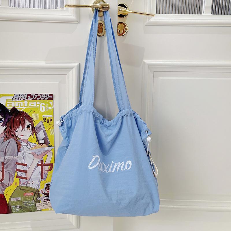 

Корейская новая сумка-тоут на кулиске, сумка с принтом букв для женщин, большая вместимость, нейлоновая, повседневная, универсальная, портативная, на плечо