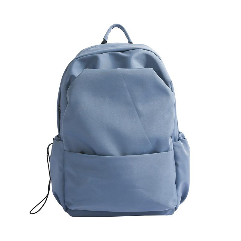 Junior high school backpack large capacity solid color backpack male simple versatile high school college student schoolbag female