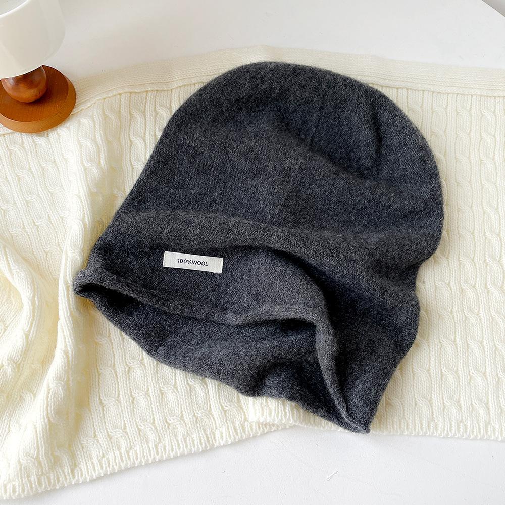 Solid color wool knitted stacking hat women's autumn and winter 0% all-wool knitted hat fashionable versatile cold hat ear protection hat