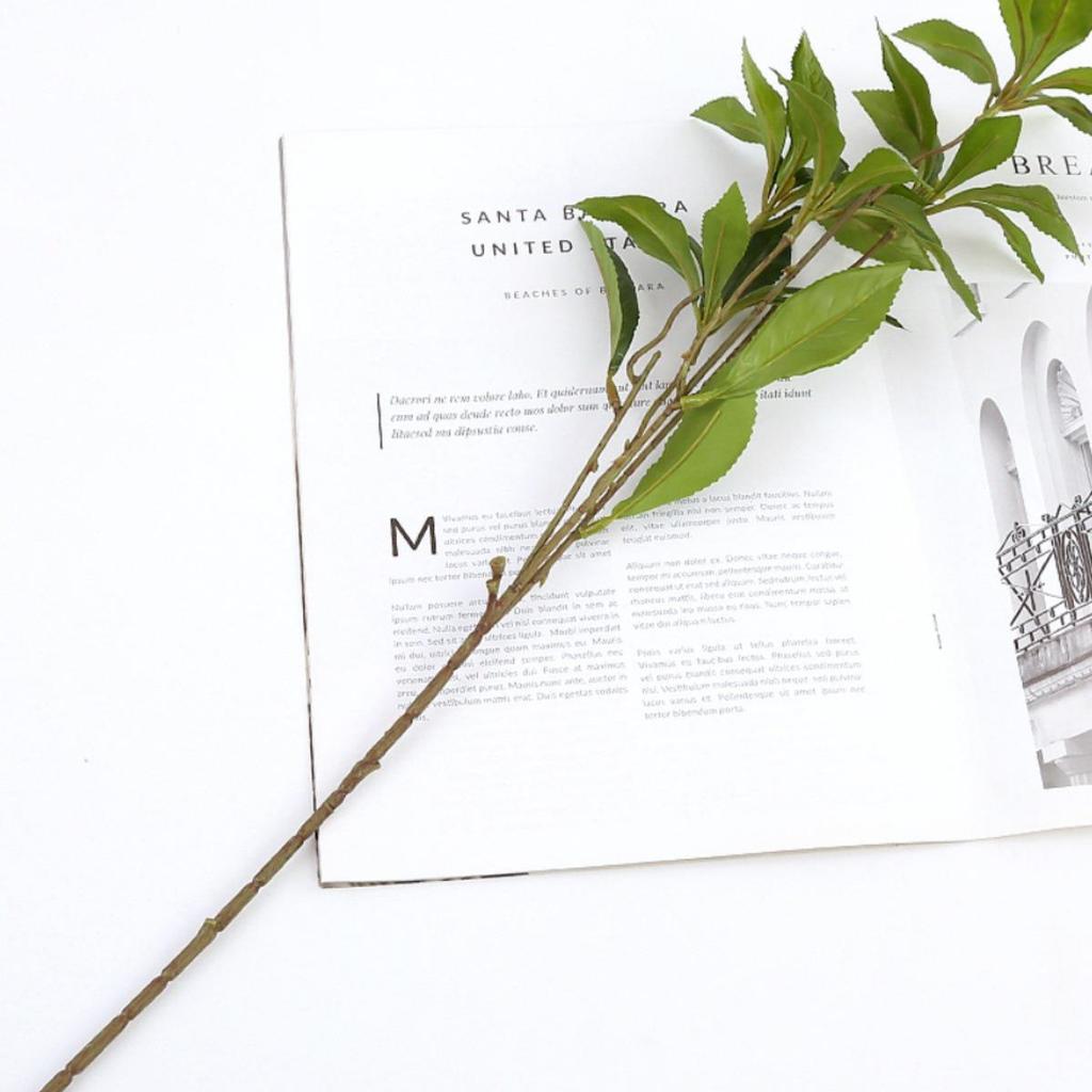 Nordic Greenery: Single Artificial Pieris Japonica Leaves for Living Room or Dining Table Decor.