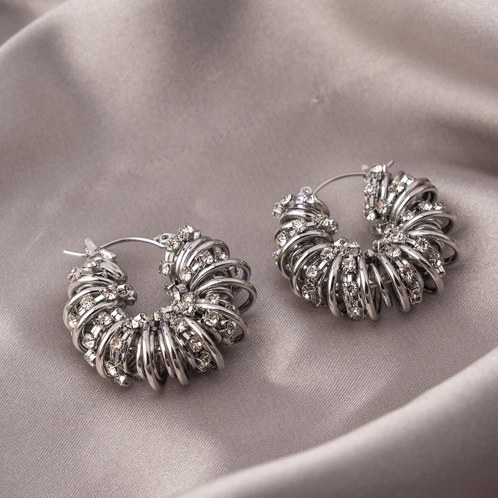 Evropské a americké spirálové náušnice s diamanty: Luxusní, špičkové kruhové náušnice s trendy, niche chladným stylem