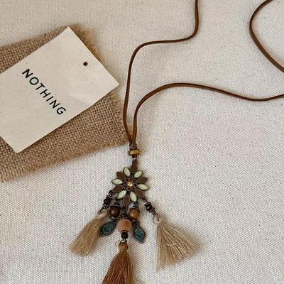 Handmade Pendant Necklace with Floral and Tassel Design Adjustable Length Leather Cord Sweater Chain Accessory for Casual Wear
