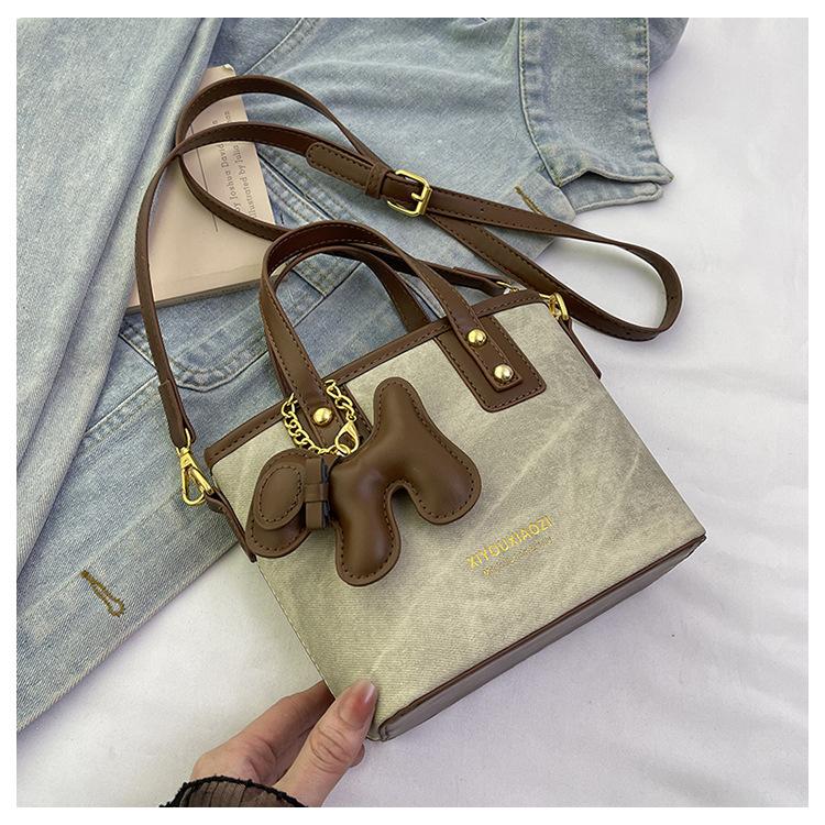 Nischen-Retro-Tasche Damen neue Frühling und Sommer vielseitige Umhängetasche exquisite tragbare Bucket Bag