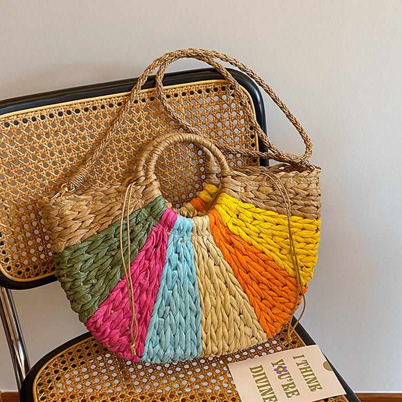 Summer new contrasting color rainbow straw bag portable shoulder oblique span women's bag