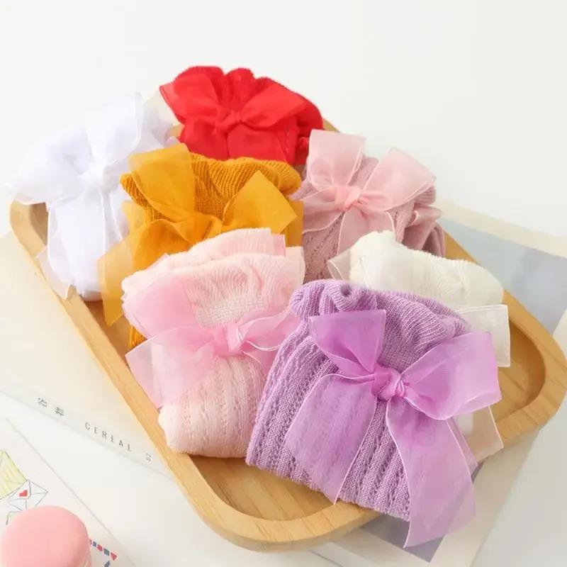1 Paar Einfarbige Kindersocken mit Schleifen Baumwolle Babymädchen Socken Baby Kleinkind Schleife In Röhrensocken Kind Hohlstricksocke 0-2J Baby