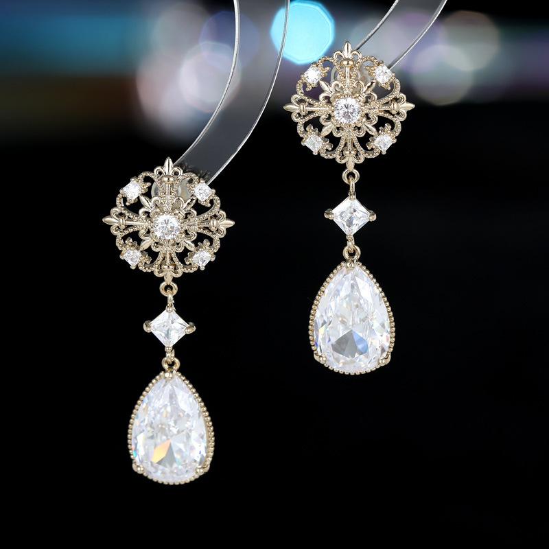 

Vintage niche geometric water drop-shaped hollow flower earrings s925 silver needle French high-end fashion temperament earrings